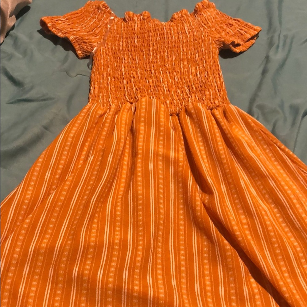 Yellow dress with white designs